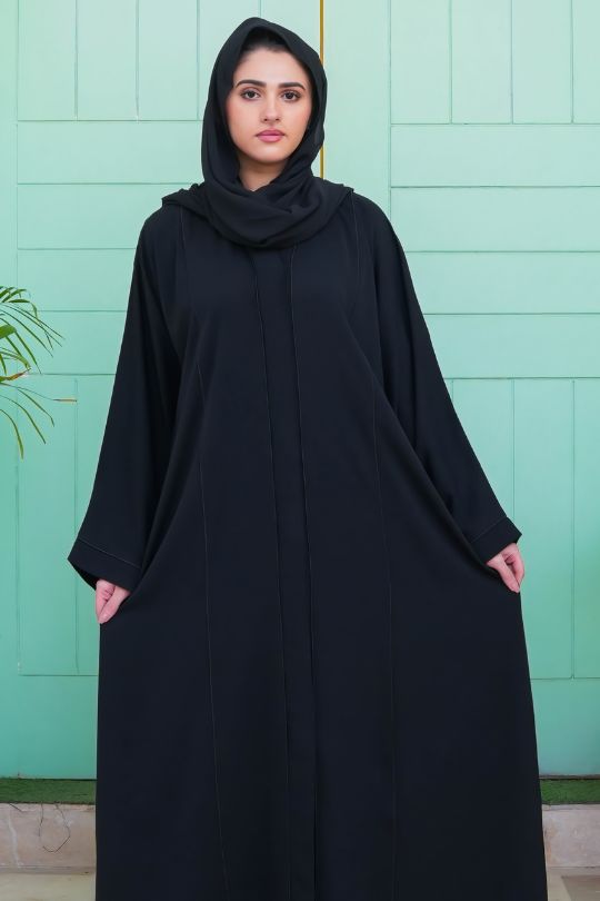 Front full view of Classic Black Front Open Plain Abaya – elegant and minimal design crafted from soft Nida fabric for modest wear.