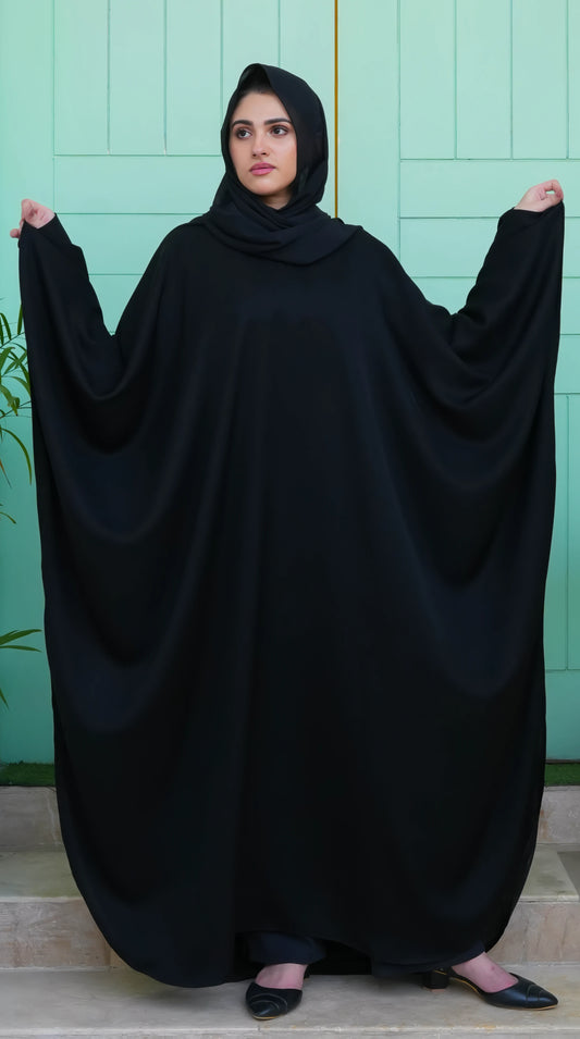 Elegant front look of Black Premium Kaftan featuring soft Nida fabric, flowing cut, and timeless modest wear design.