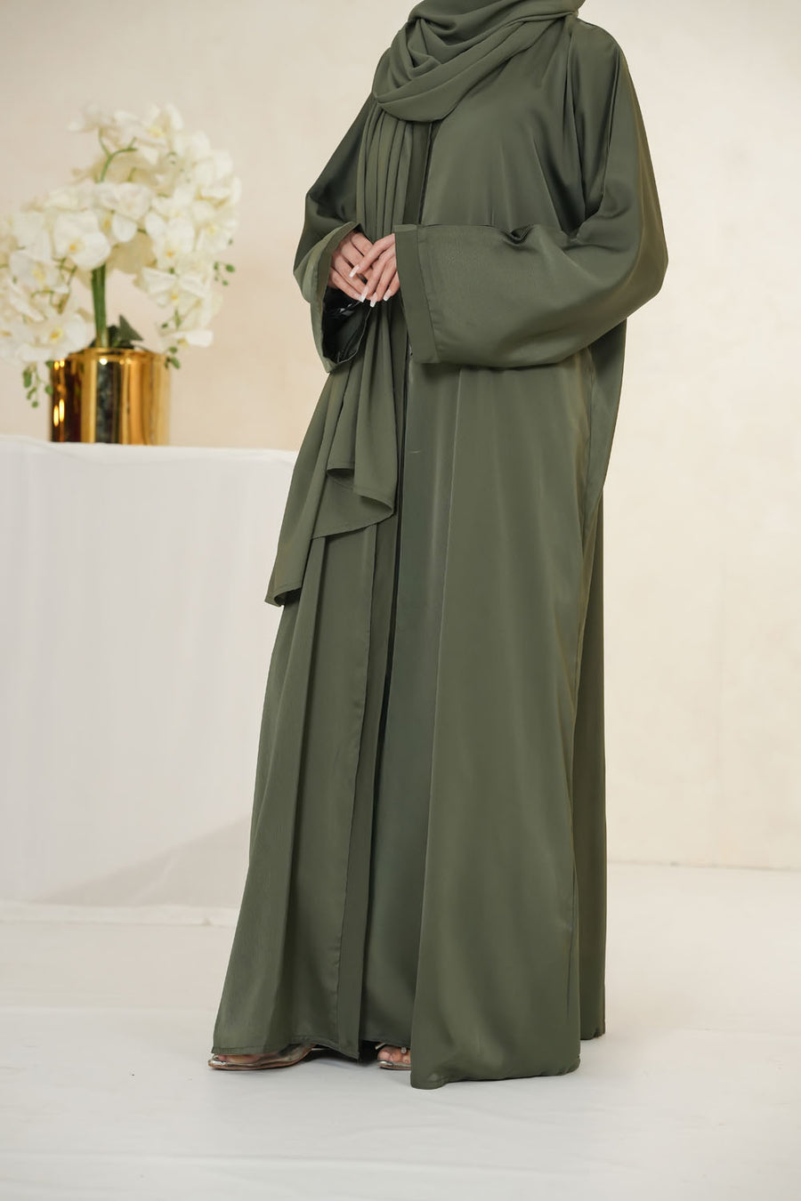 Green Imported TikTok Crinkle Nida Fabric Abaya front full view with graceful fall and lightweight fabric