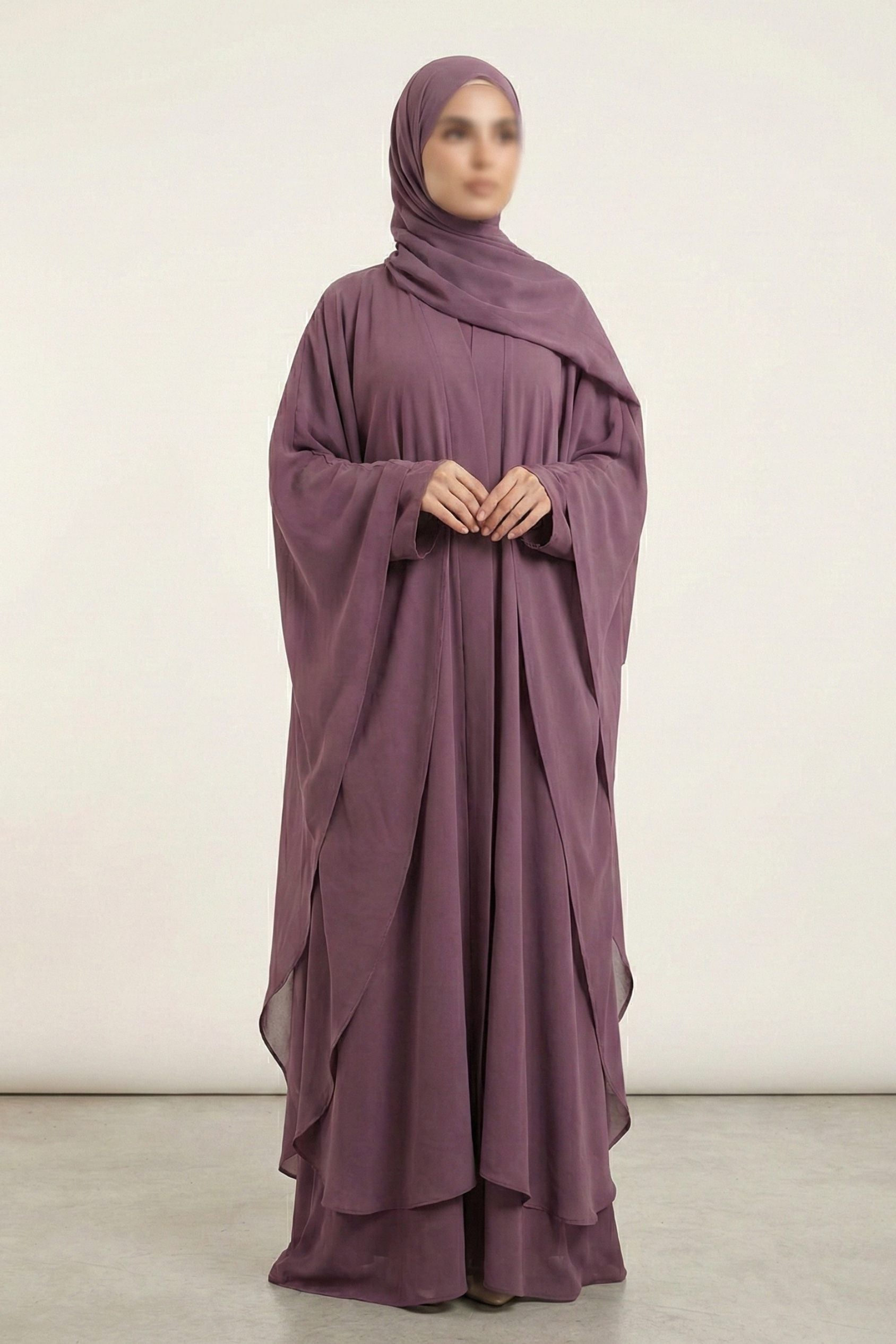 Halimah butterfly abaya for women in plum color front full view worn by model showing flowy double layer chiffon fabric