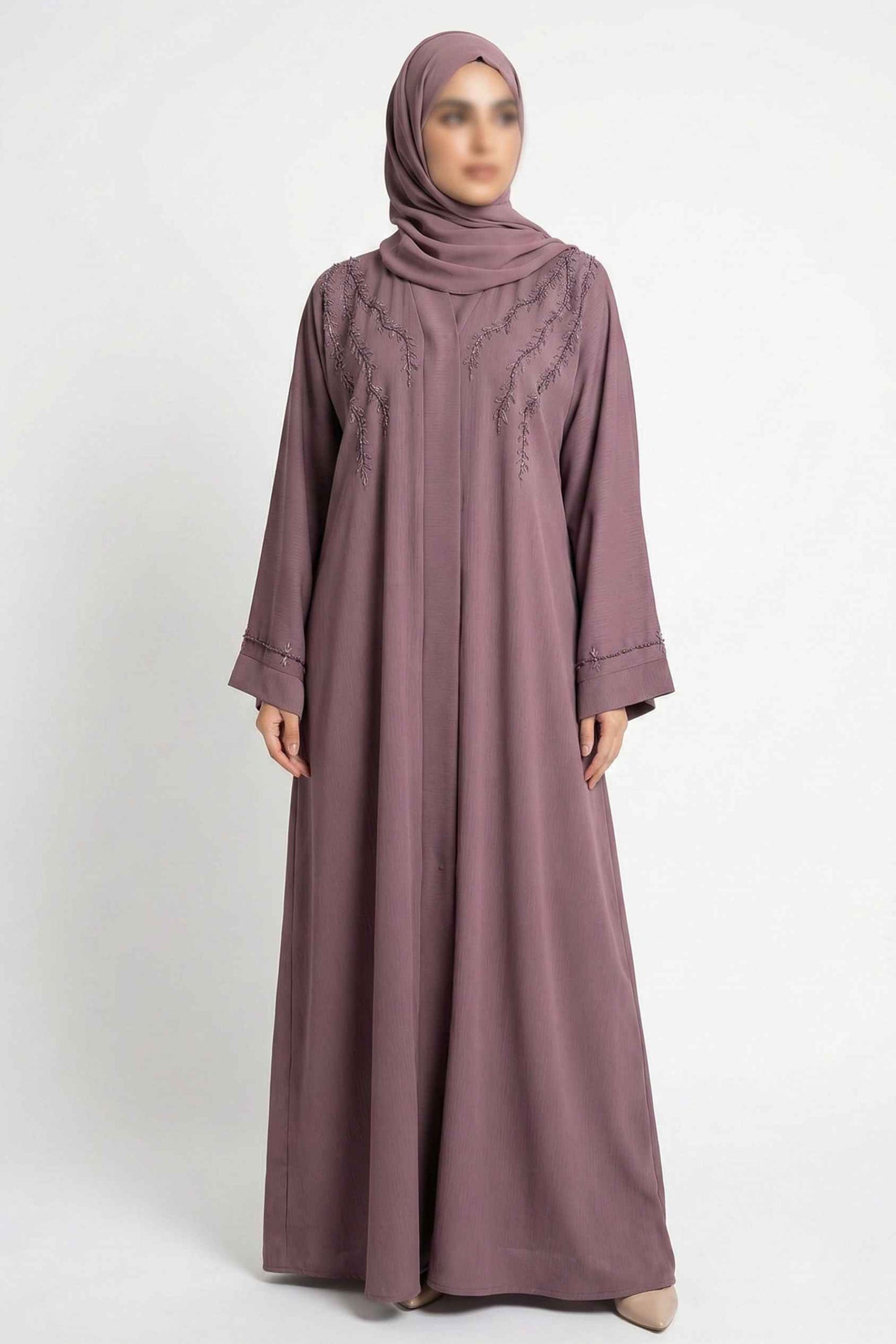 Luxury pinkish abaya for women front full view featuring handcrafted bow work and elegant flowing nida fabric