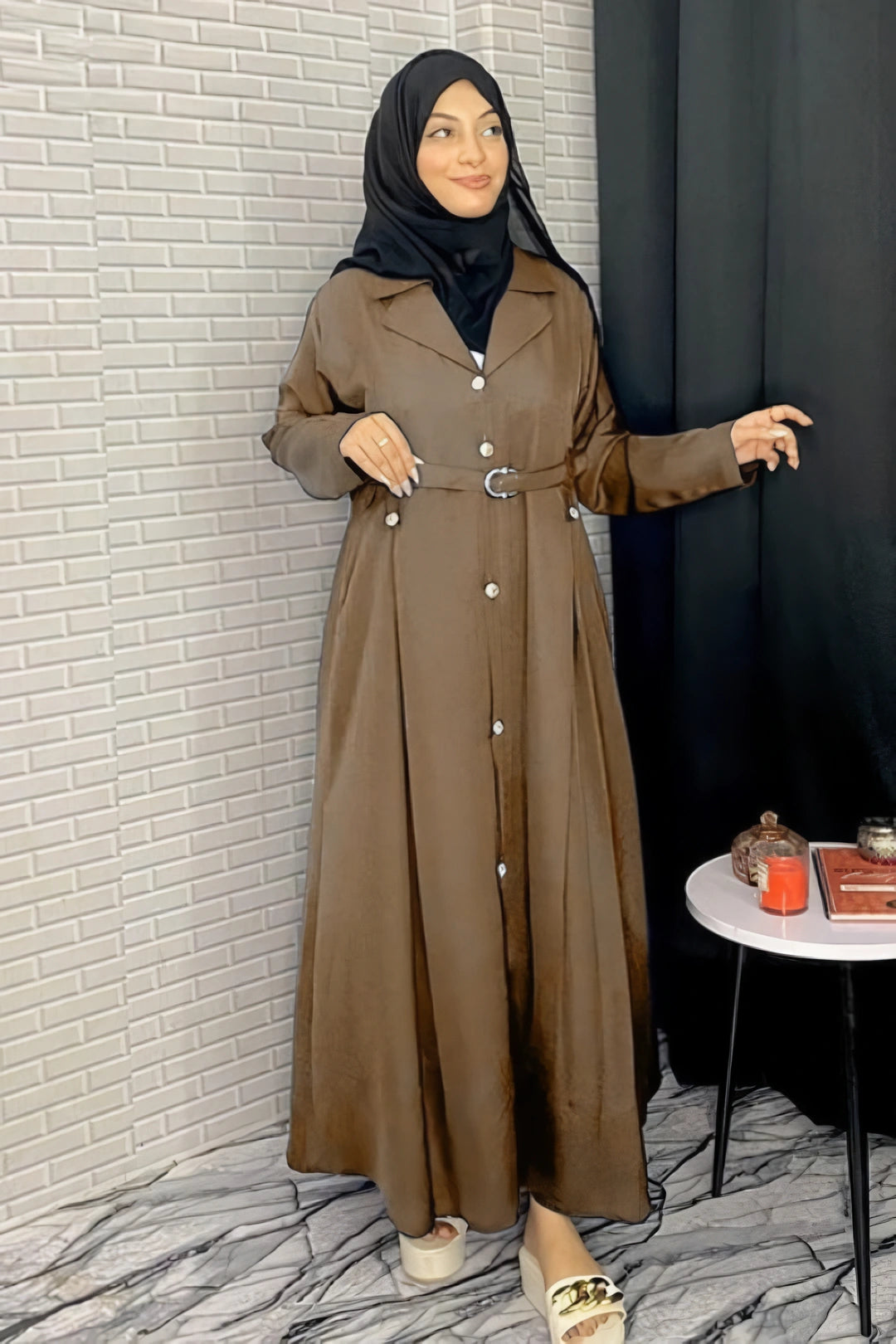 Front full view of Turkish-style brown abaya featuring elegant multi-color panels, smooth lightweight fabric, and classic modest fit.